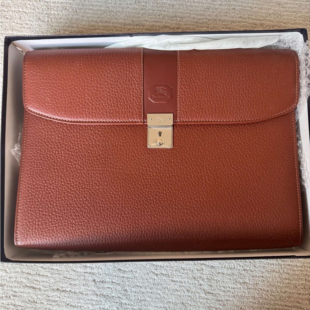 Vintage Burberry Brown Leather Briefcase with silver-tone lock closure